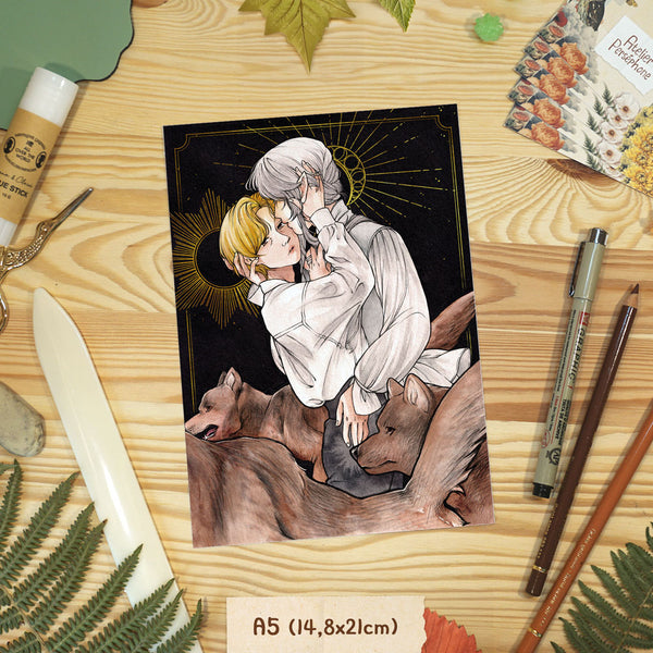 Print of two people embracing, a prince and a fae, with wolves, on a wooden surface with stationery items.