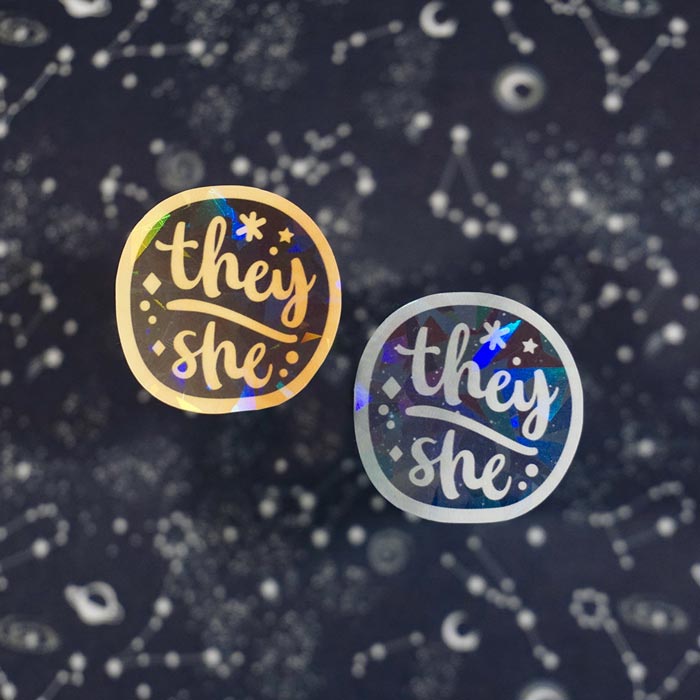 set of two stickers of the pronoun they she made by a lgbtq friendly business